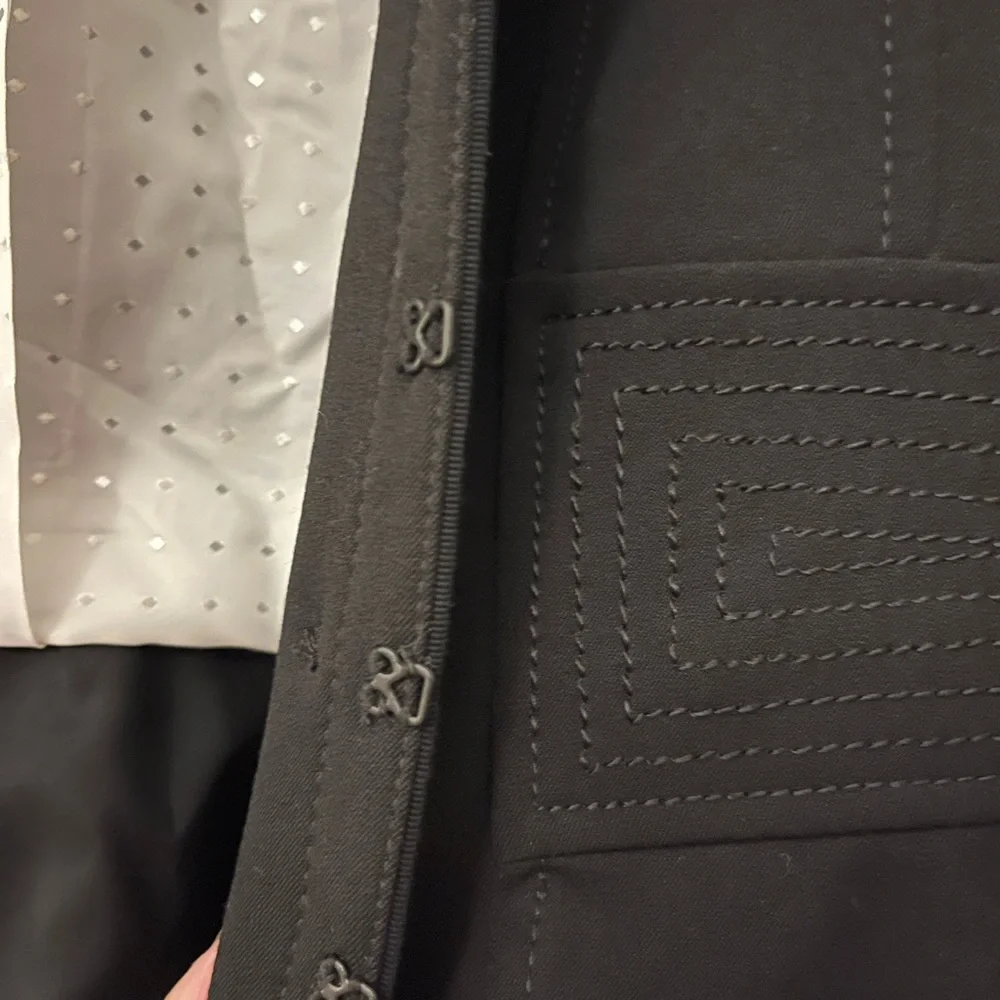 WHBM women’s blazer size 4 black.
